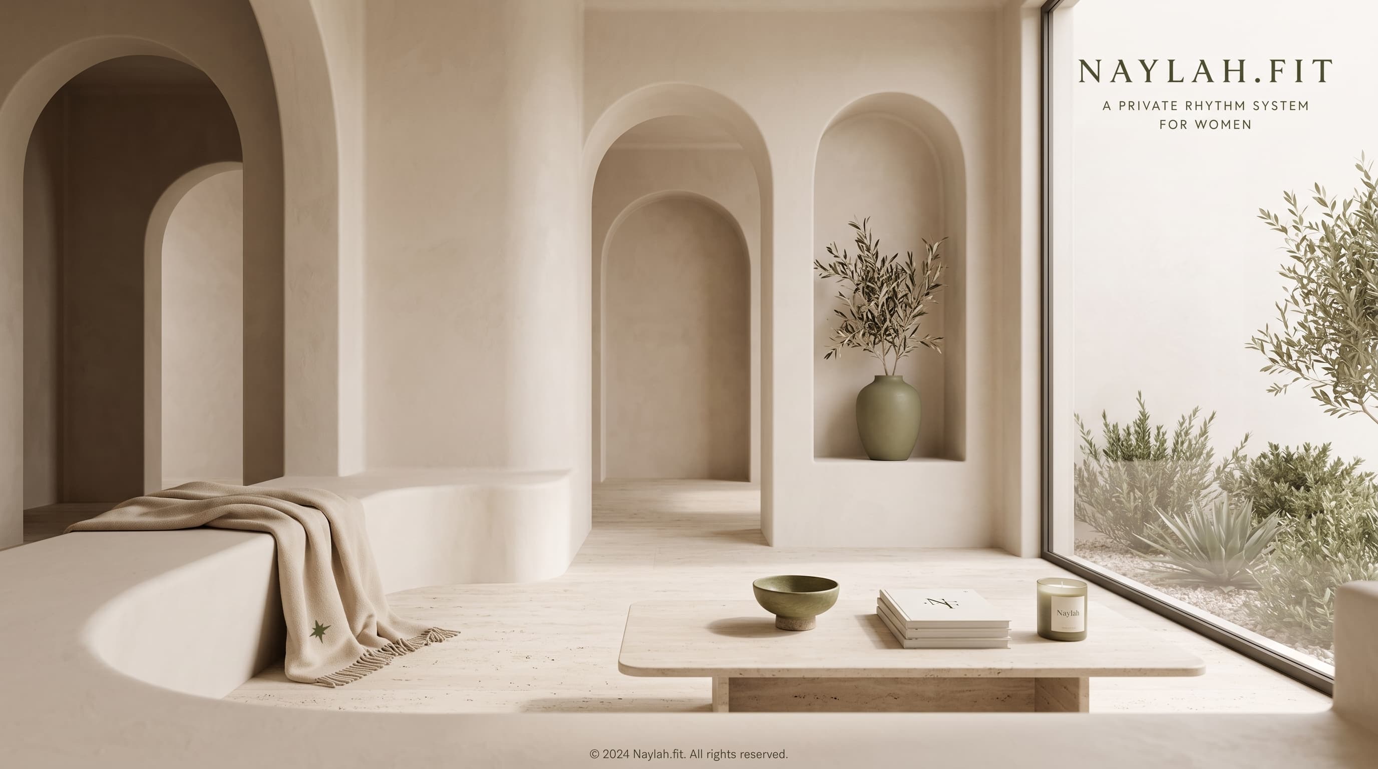 A calm cream interior with soft arches and an olive vase